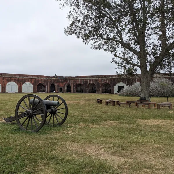 Courtyard with cannon and tree