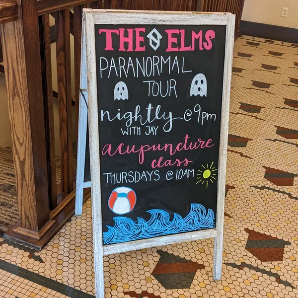 Paranormal tour sign