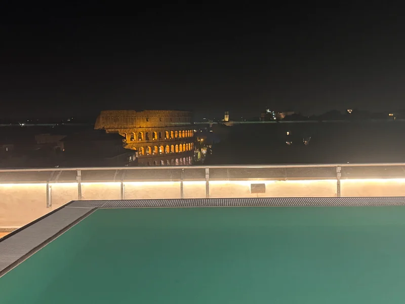 Colosseum from pool Mercure Roma Centro Colosseo